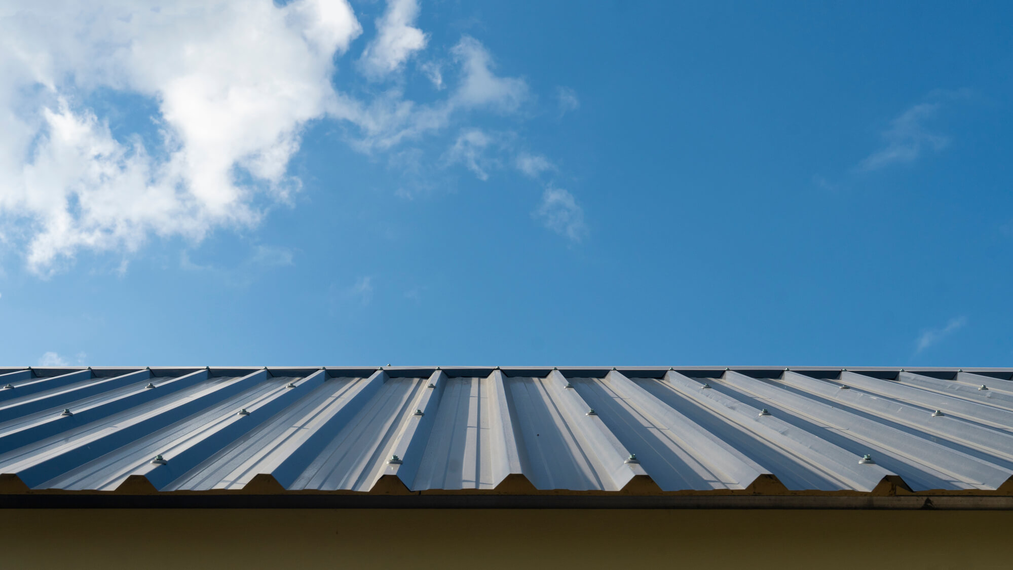 commercial metal roofing with a slope