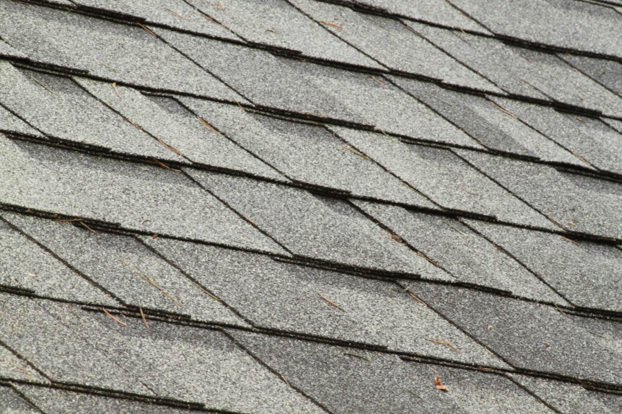 roof shingles replacing commercial metal roofing