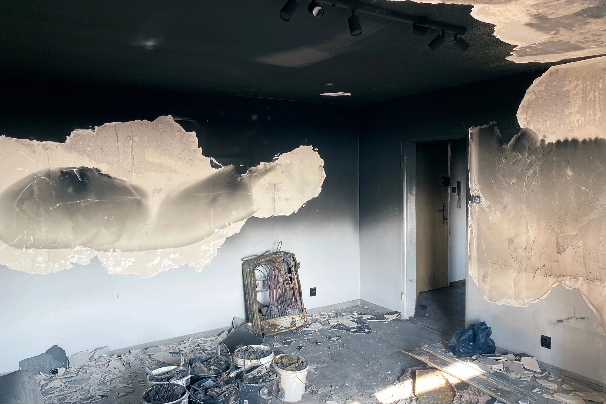 room with soot needs commercial fire damage restoration
