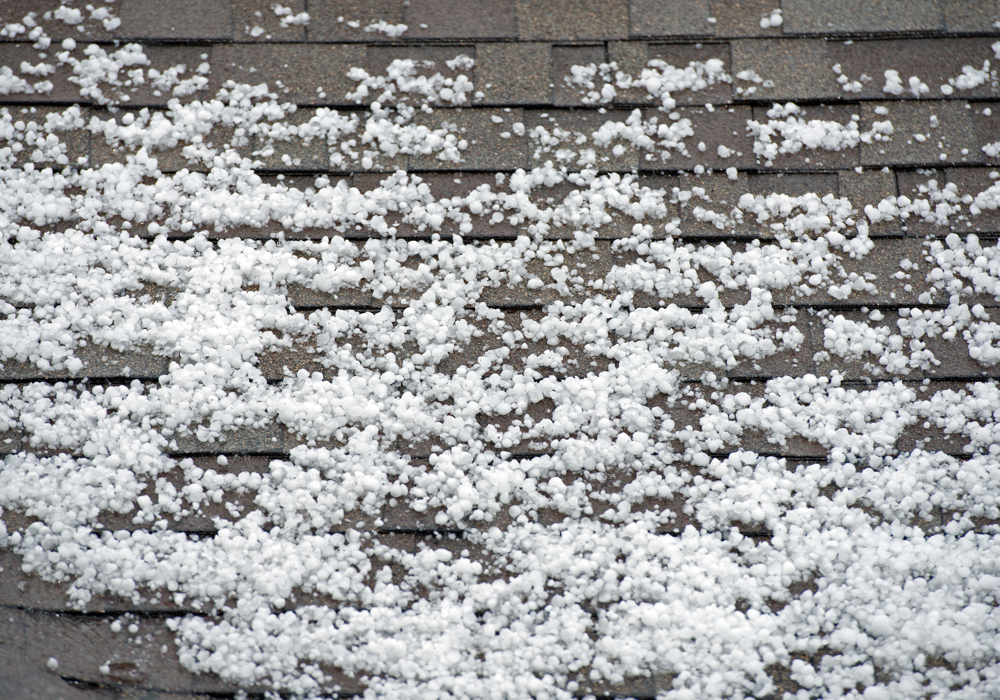 commercial roofing with hail accumulation